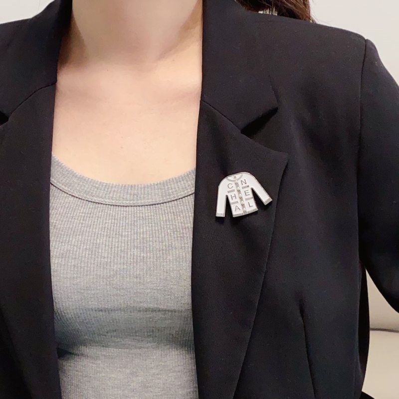 Ch**el brooches